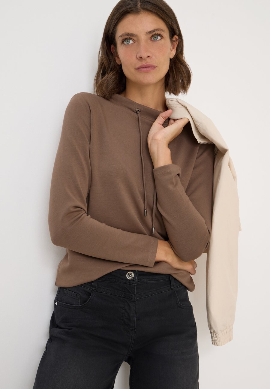Топ Cecil FUNNEL NECK, Braun/Taupe
Топ Cecil FUNNEL NECK, Braun/Taupe