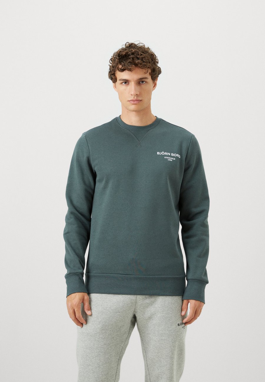 Толстовка Björn Borg ESSENTIAL, Petrol/Mottled Teal
Толстовка Björn Borg ESSENTIAL, Petrol/Mottled Teal
