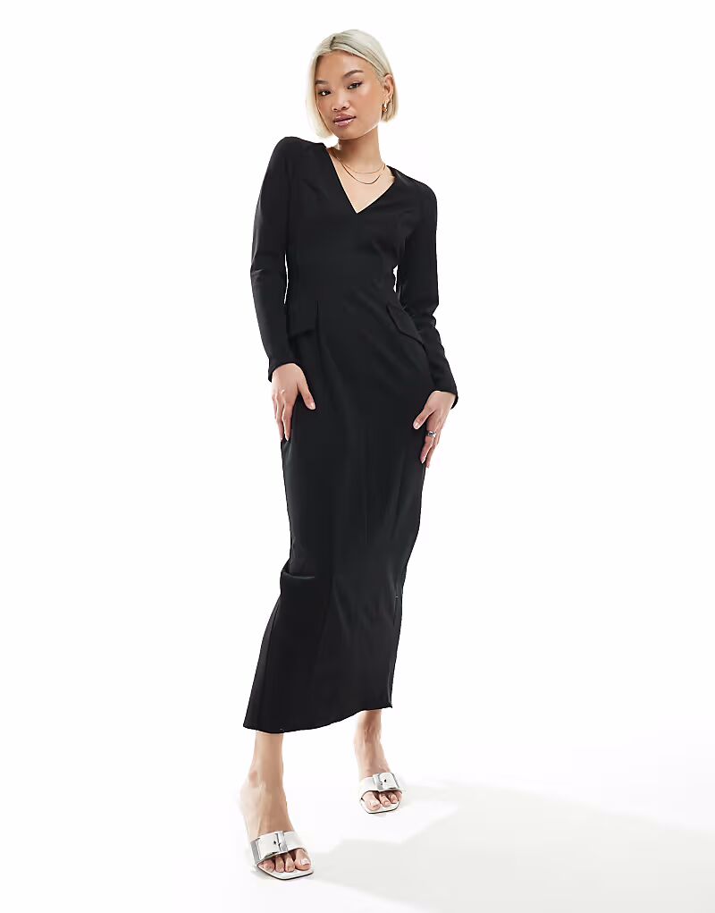 Платье миди с длинными рукавами, V-образным вырезом и стежками черного цвета от ASOS DESIGN
Платье миди с длинными рукавами, V-образным вырезом и стежками черного цвета от ASOS DESIGN