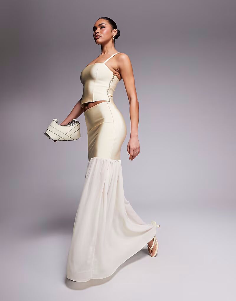 Юбка макси с баской и бандажом от ASOS DESIGN цвета пахты
Юбка макси с баской и бандажом от ASOS DESIGN цвета пахты