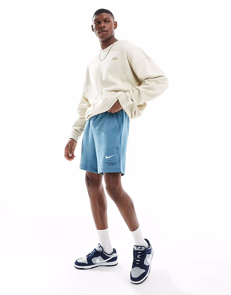 Шорты с графическим принтом Nike Swoosh синего цвета
Шорты с графическим принтом Nike Swoosh синего цвета