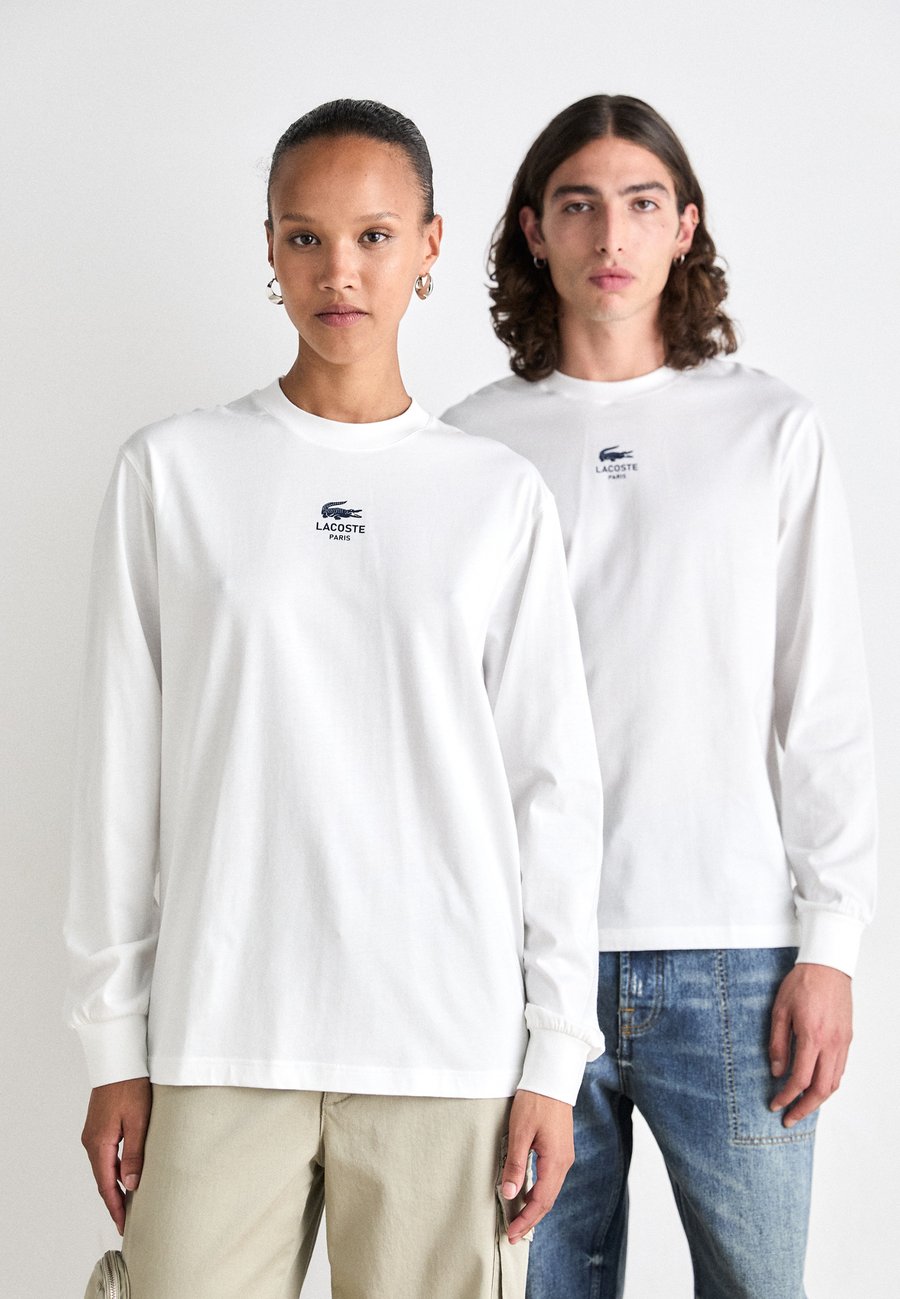 Топ Lacoste UNISEX, Flour/Off-White
Топ Lacoste UNISEX, Flour/Off-White