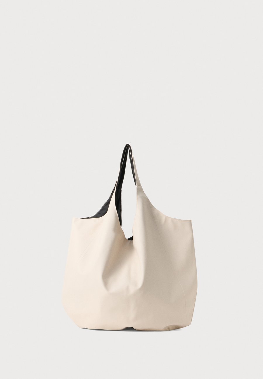 Сумка-шоппер Stutterheim SVEA BAG, Light Sand/Sand
Сумка-шоппер Stutterheim SVEA BAG, Light Sand/Sand
