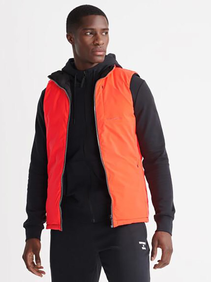 Superdry Двусторонний жилет оранжевого цвета
Superdry Двусторонний жилет оранжевого цвета