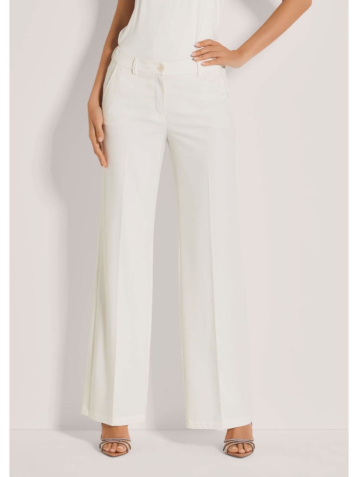 MADELEINE Белые брюки-палаццо с отглаженными краями
MADELEINE Белые брюки-палаццо с отглаженными краями