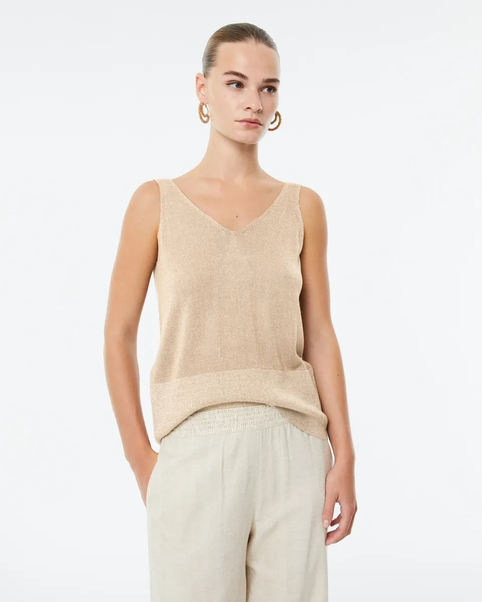 Блестящий женский топ из трикотажного полотна с V-образным вырезом спереди и сзади Paz Torras, бежевый
Блестящий женский топ из трикотажного полотна с V-образным вырезом спереди и сзади Paz Torras, бежевый
