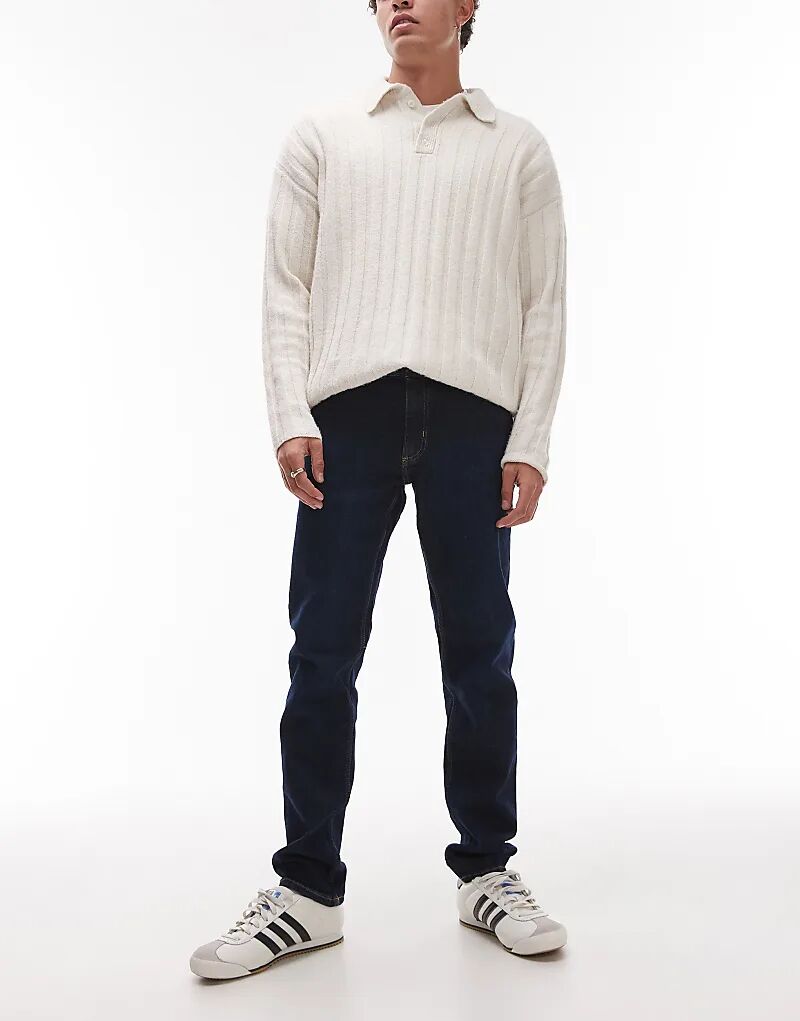 Узкие джинсы темно-синего цвета Mango
Узкие джинсы темно-синего цвета Mango