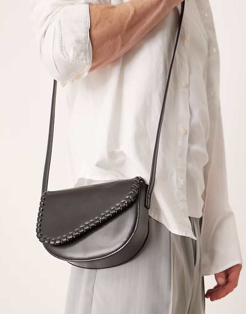 Сумка через плечо ASOS DESIGN из искусственной кожи с отделкой в виде зигзага черного цвета
Сумка через плечо ASOS DESIGN из искусственной кожи с отделкой в виде зигзага черного цвета