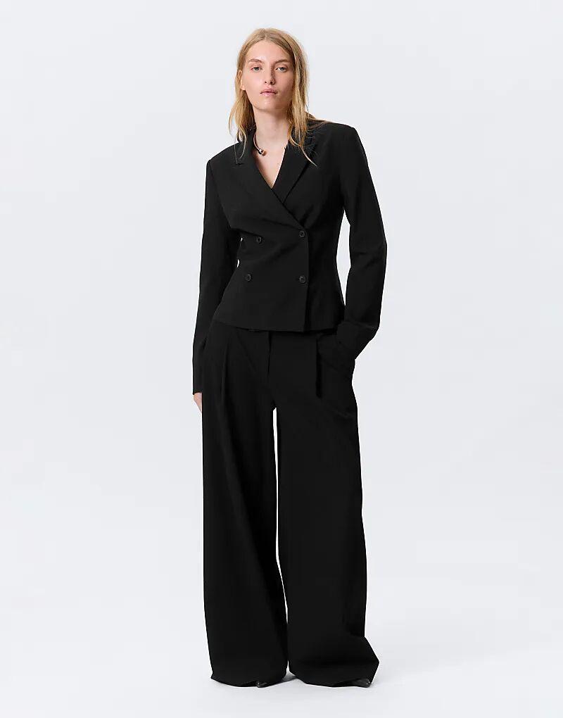 Приталенный двубортный пиджак Weekday черного цвета
Приталенный двубортный пиджак Weekday черного цвета