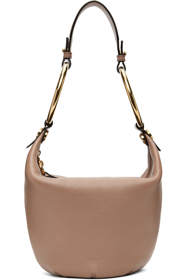 Маленькая сумка-браслет Chloé, цвет woodrose
Маленькая сумка-браслет Chloé, цвет woodrose
