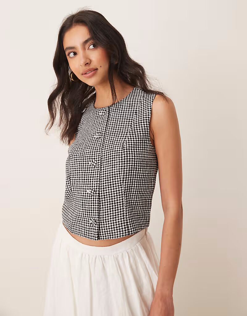 Укороченный топ Abercrombie & Fitch из льна с высоким воротом в черную клетку в клетку
Укороченный топ Abercrombie & Fitch из льна с высоким воротом в черную клетку в клетку