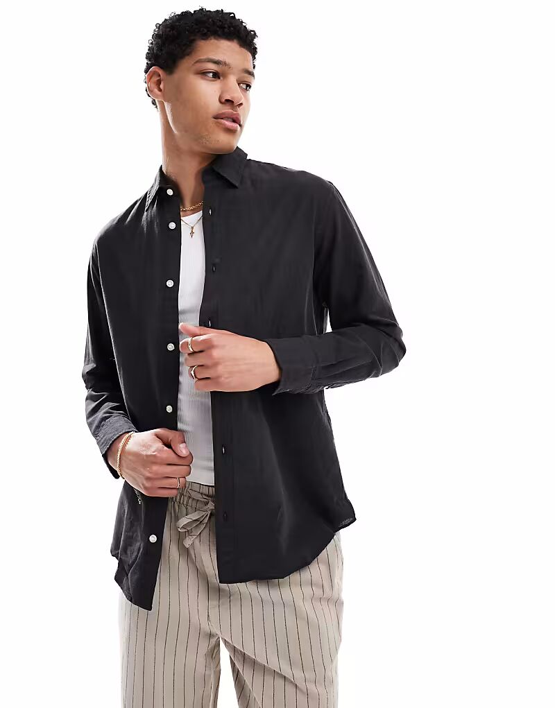 Льняная рубашка Jack & Jones черного цвета
Льняная рубашка Jack & Jones черного цвета