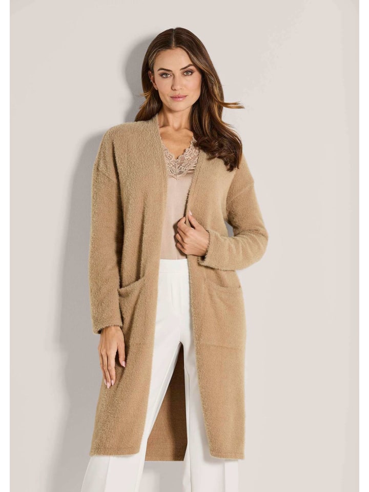 MADELEINE Элегантное простое вязаное пальто бежевого цвета
MADELEINE Элегантное простое вязаное пальто бежевого цвета