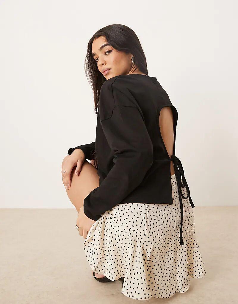 Футболка с длинными рукавами и завязкой сзади от ASOS DESIGN, черный цвет
Футболка с длинными рукавами и завязкой сзади от ASOS DESIGN, черный цвет