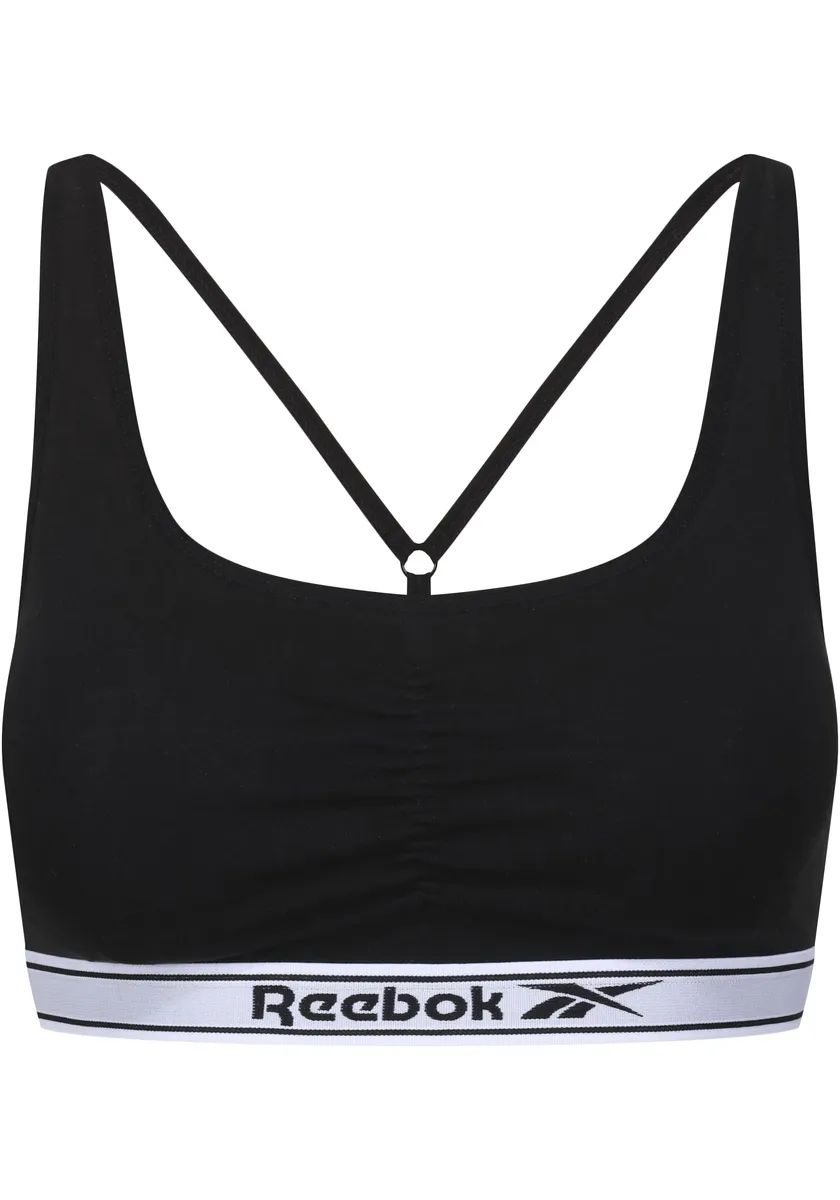 Бюстье Reebok "Jackie", надпись-логотип на полосе под грудью, оборки спереди, черный
Бюстье Reebok "Jackie", надпись-логотип на полосе под грудью, оборки спереди, черный