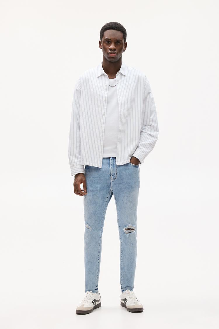 Джинсы с рваными краями Pull And Bear, синий 
Джинсы с рваными краями Pull And Bear, синий