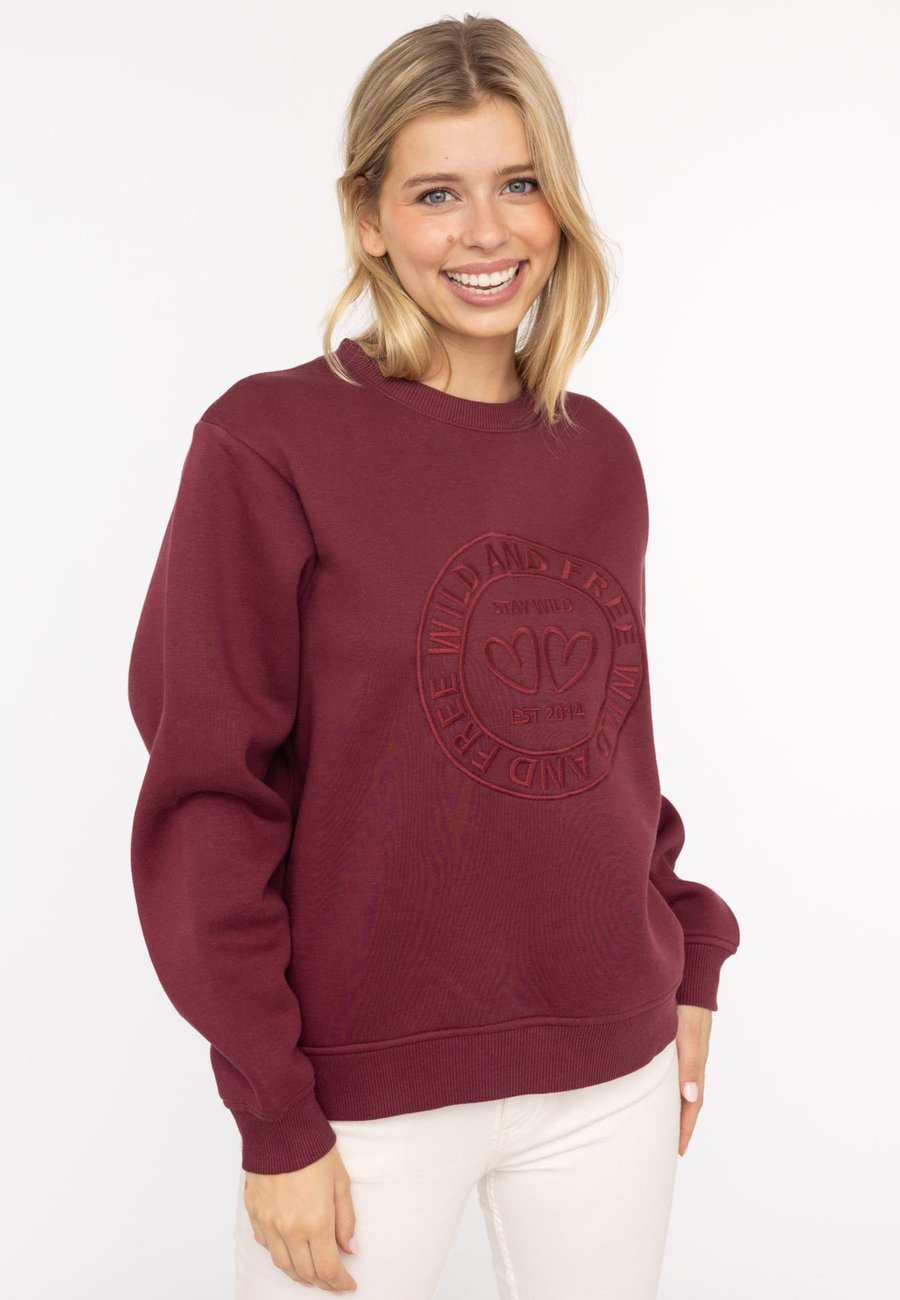 Толстовка Zwillingsherz WILD AND FREE, Rot/Red
Толстовка Zwillingsherz WILD AND FREE, Rot/Red