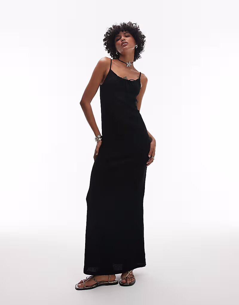 Платье макси Topshop с завязками спереди и жатым узором черного цвета
Платье макси Topshop с завязками спереди и жатым узором черного цвета