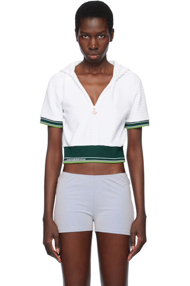 Белая текстурированная велюровая теннисная укороченная футболка с капюшоном Casablanca
Белая текстурированная велюровая теннисная укороченная футболка с капюшоном Casablanca