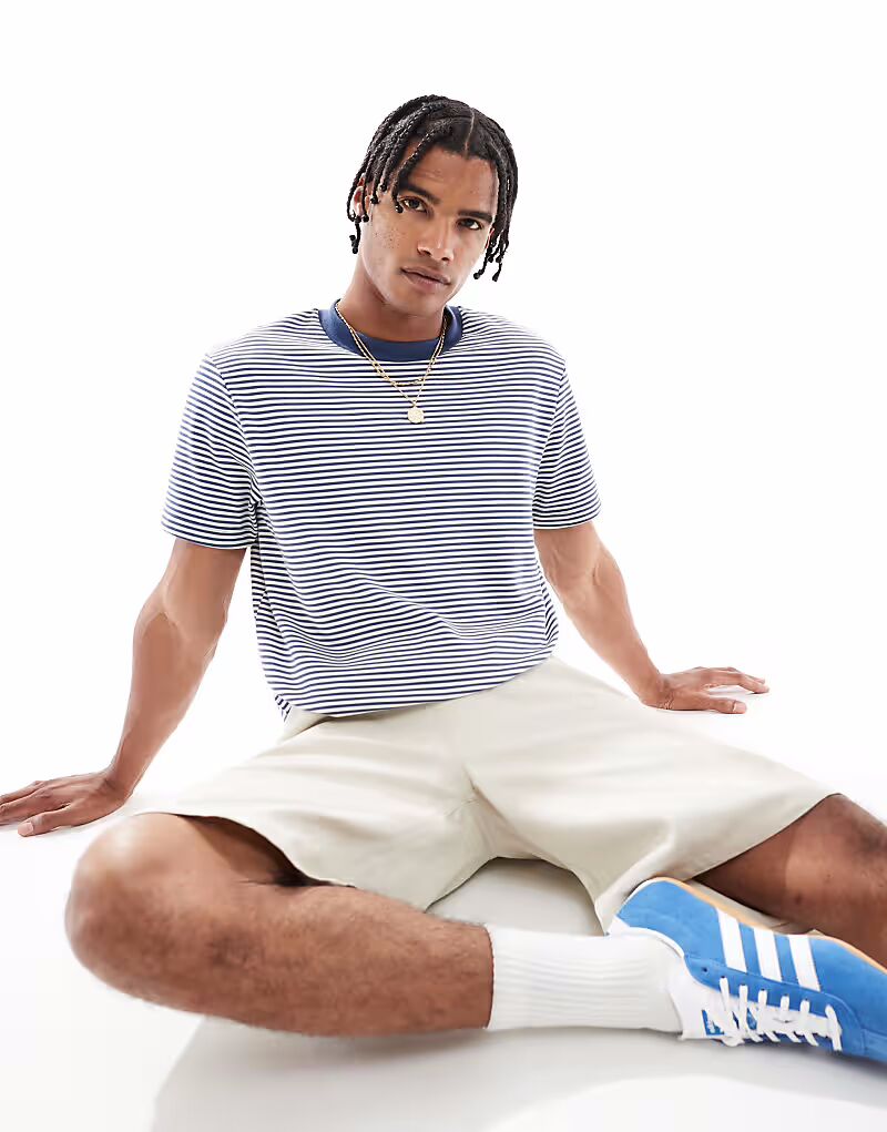 Укороченная футболка ASOS DESIGN в сине-белую полоску
Укороченная футболка ASOS DESIGN в сине-белую полоску