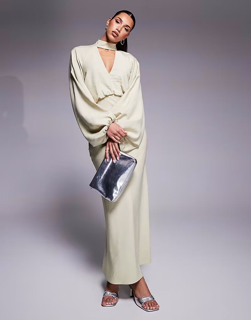 Платье макси с высоким воротом, глубоким декольте и рукавами-блузонами нежно-зеленого цвета Asos Design
Платье макси с высоким воротом, глубоким декольте и рукавами-блузонами нежно-зеленого цвета Asos Design