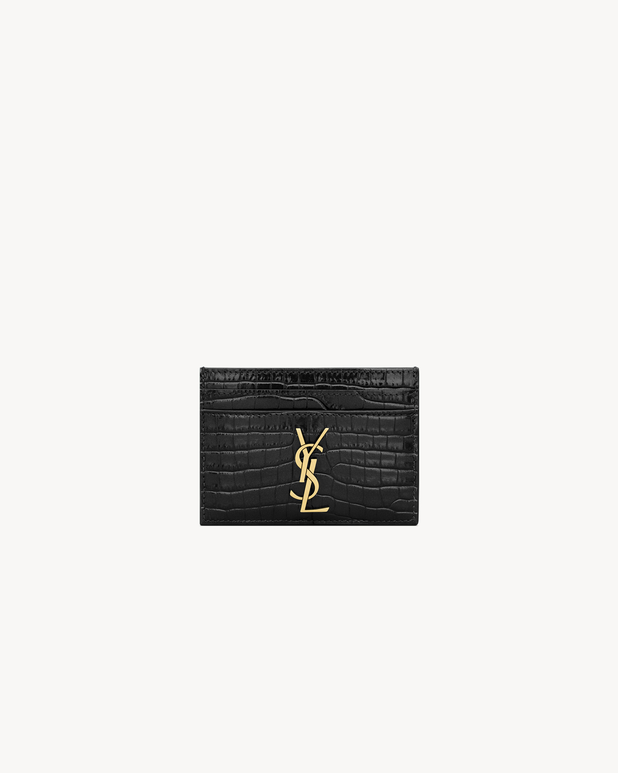 Картхолдер CASSANDRE из лакированной кожи с тиснением под крокодила Saint Laurent, черный
Картхолдер CASSANDRE из лакированной кожи с тиснением под крокодила Saint Laurent, черный