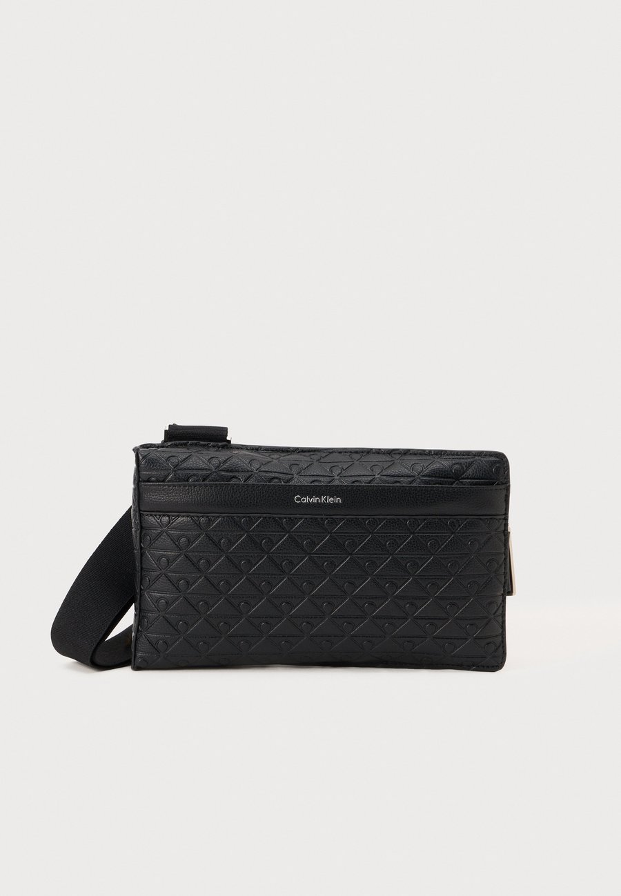Сумка кросс-боди Calvin Klein EMBLEM EMBOSS SQUARE SLING, Black
Сумка кросс-боди Calvin Klein EMBLEM EMBOSS SQUARE SLING, Black