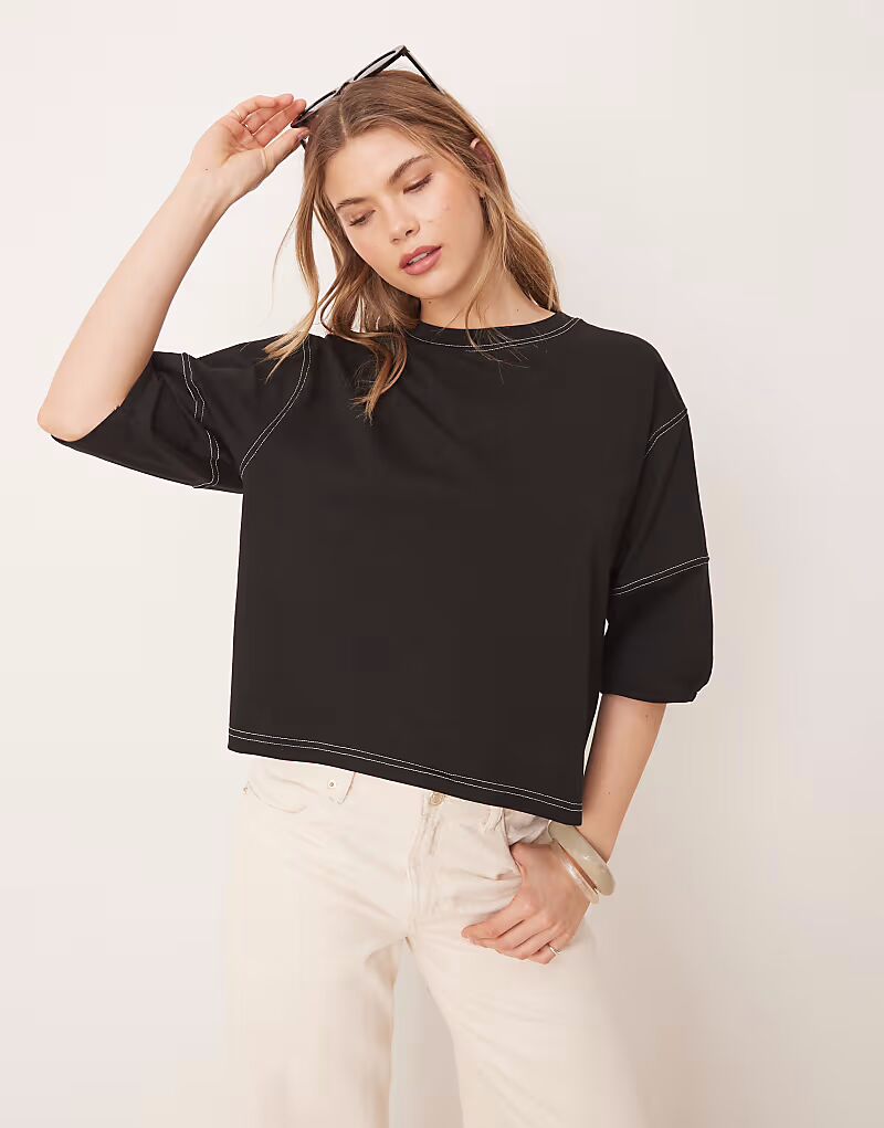 Укороченная футболка свободного кроя ASOS DESIGN черного цвета с контрастной строчкой
Укороченная футболка свободного кроя ASOS DESIGN черного цвета с контрастной строчкой