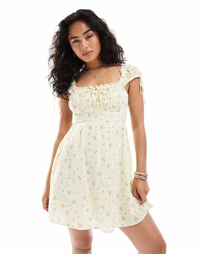 Мини-платье New Look в стиле молочницы с желтым цветочным узором
Мини-платье New Look в стиле молочницы с желтым цветочным узором