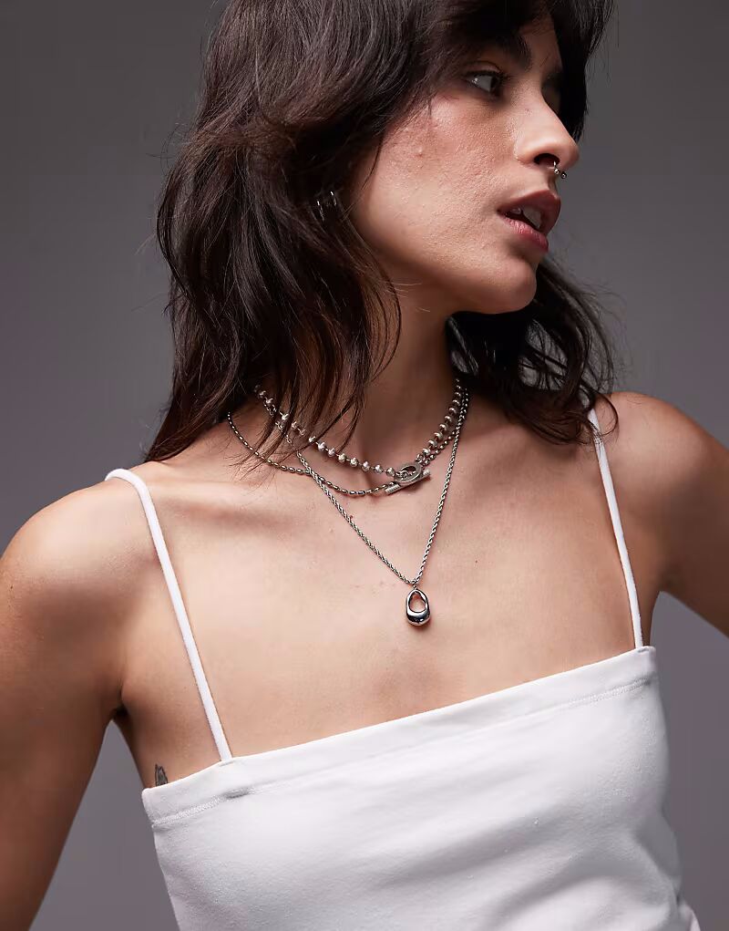 Топ-труба Topshop на тонких бретельках белого цвета
Топ-труба Topshop на тонких бретельках белого цвета