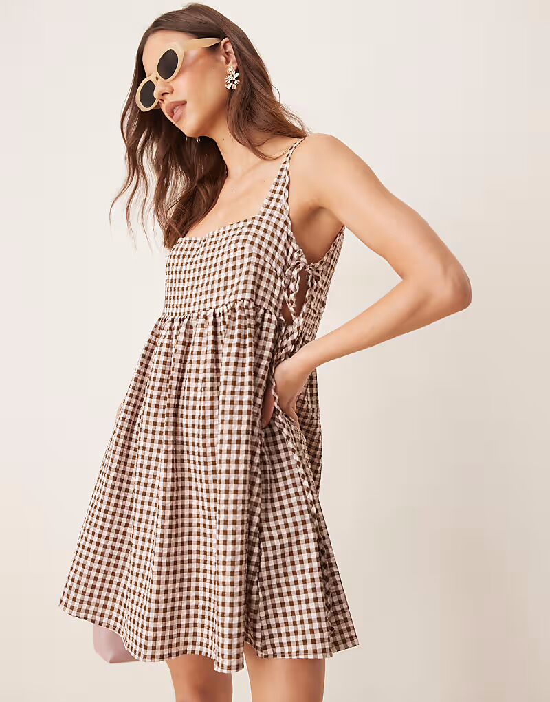 ASOS DESIGN мини-платье в стиле бэби-долл с завязками по бокам в коричневую клетку
ASOS DESIGN мини-платье в стиле бэби-долл с завязками по бокам в коричневую клетку