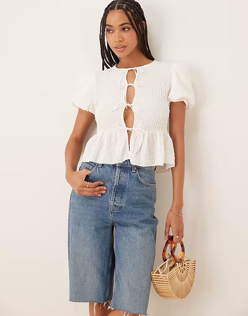 Блузка с завязками спереди из гофрированной ткани цвета манго кремового цвета Mango
Блузка с завязками спереди из гофрированной ткани цвета манго кремового цвета Mango