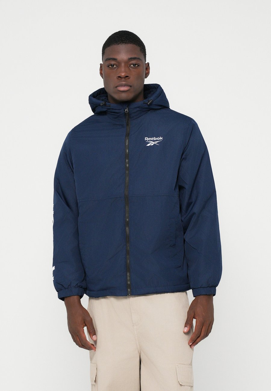 Куртка Reebok WINDBREAKER, Vector Navy/Dark Blue
Куртка Reebok WINDBREAKER, Vector Navy/Dark Blue