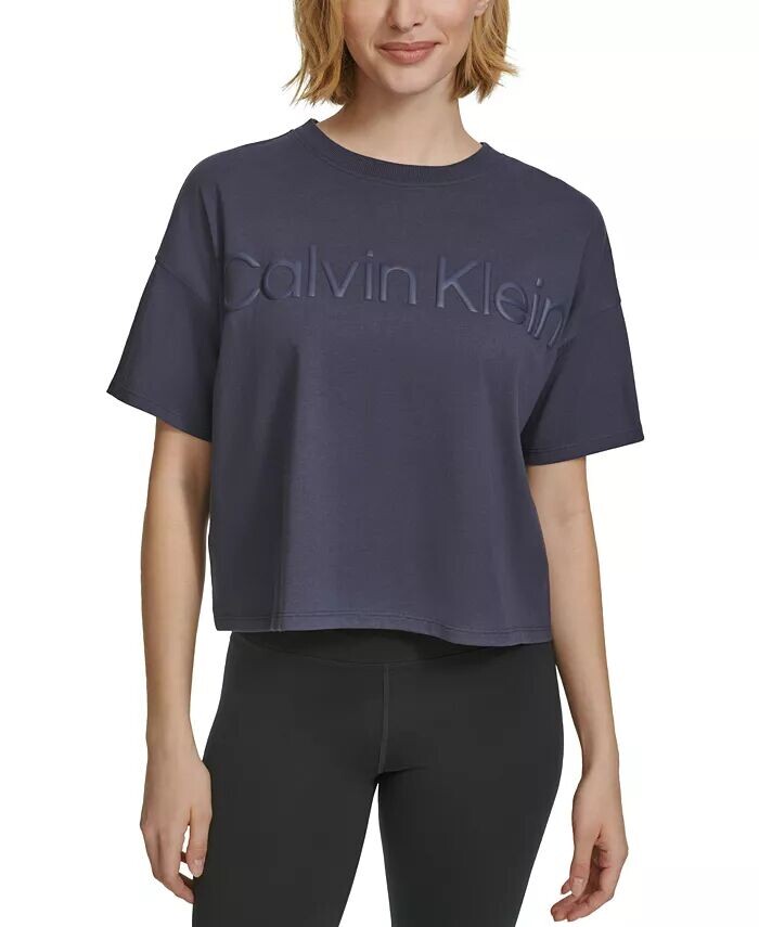 Женская хлопковая укороченная футболка с рельефным логотипом Calvin Klein, черный
Женская хлопковая укороченная футболка с рельефным логотипом Calvin Klein, черный