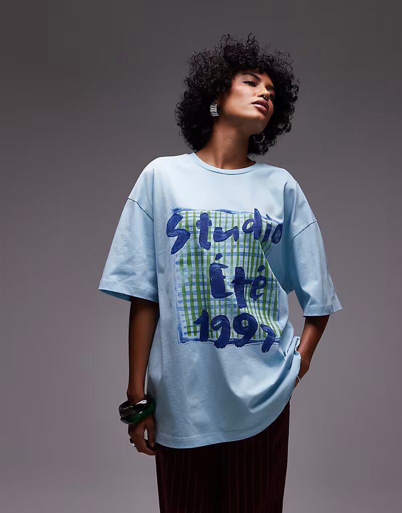 Топ свободного кроя из джерси Topshop с графическим принтом в виде шарфа светло-голубого цвета
Топ свободного кроя из джерси Topshop с графическим принтом в виде шарфа светло-голубого цвета