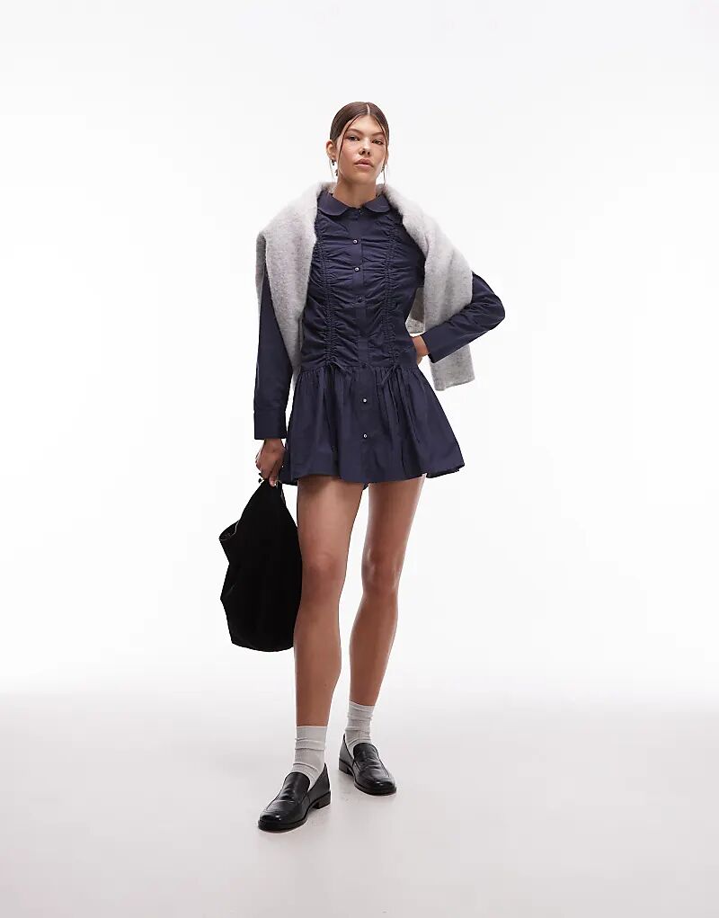 Платье-рубашка мини с длинными рукавами и сборками COLLUSION темно-синего цвета
Платье-рубашка мини с длинными рукавами и сборками COLLUSION темно-синего цвета