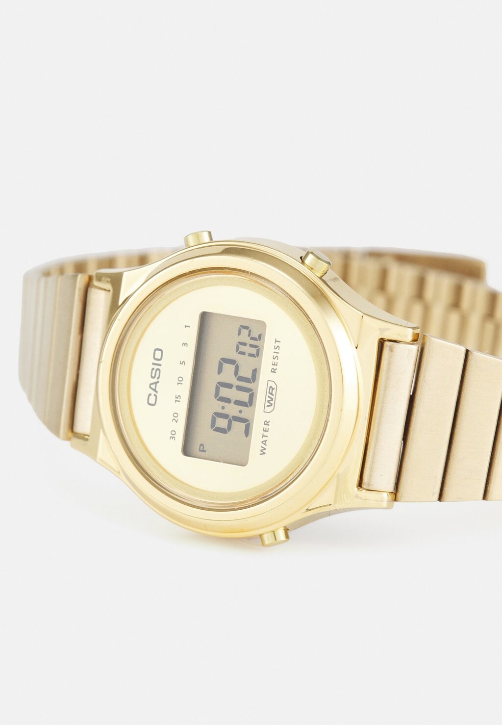 Цифровые часы La700 Casio, золотого цвета 
Цифровые часы La700 Casio, золотого цвета