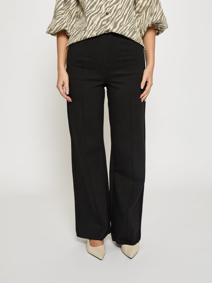 Брюки черного цвета minus
Брюки черного цвета minus