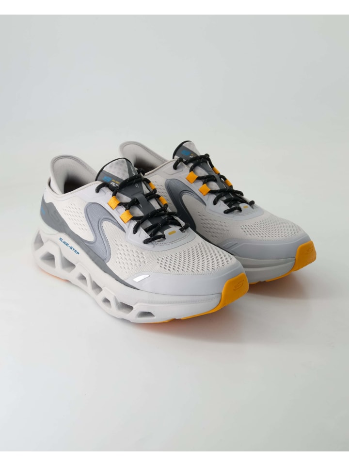 Низкие кеды серого цвета Skechers
Низкие кеды серого цвета Skechers