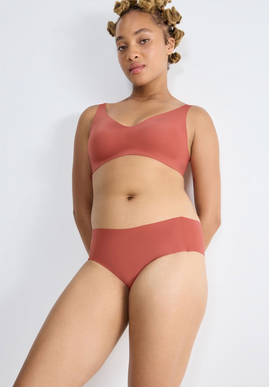 Брифы Sloggi 4-PACK FEEL HIPSTER, Candid Orange/Orange
Брифы Sloggi 4-PACK FEEL HIPSTER, Candid Orange/Orange