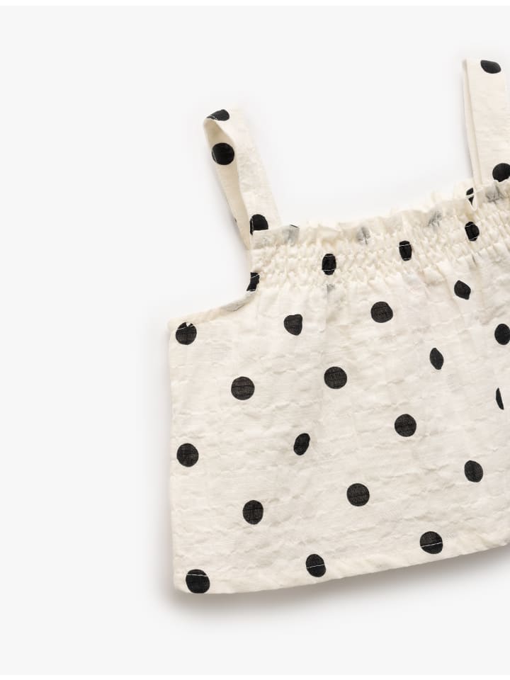 Узорчатая блузка цвета экрю KOTON
Узорчатая блузка цвета экрю KOTON