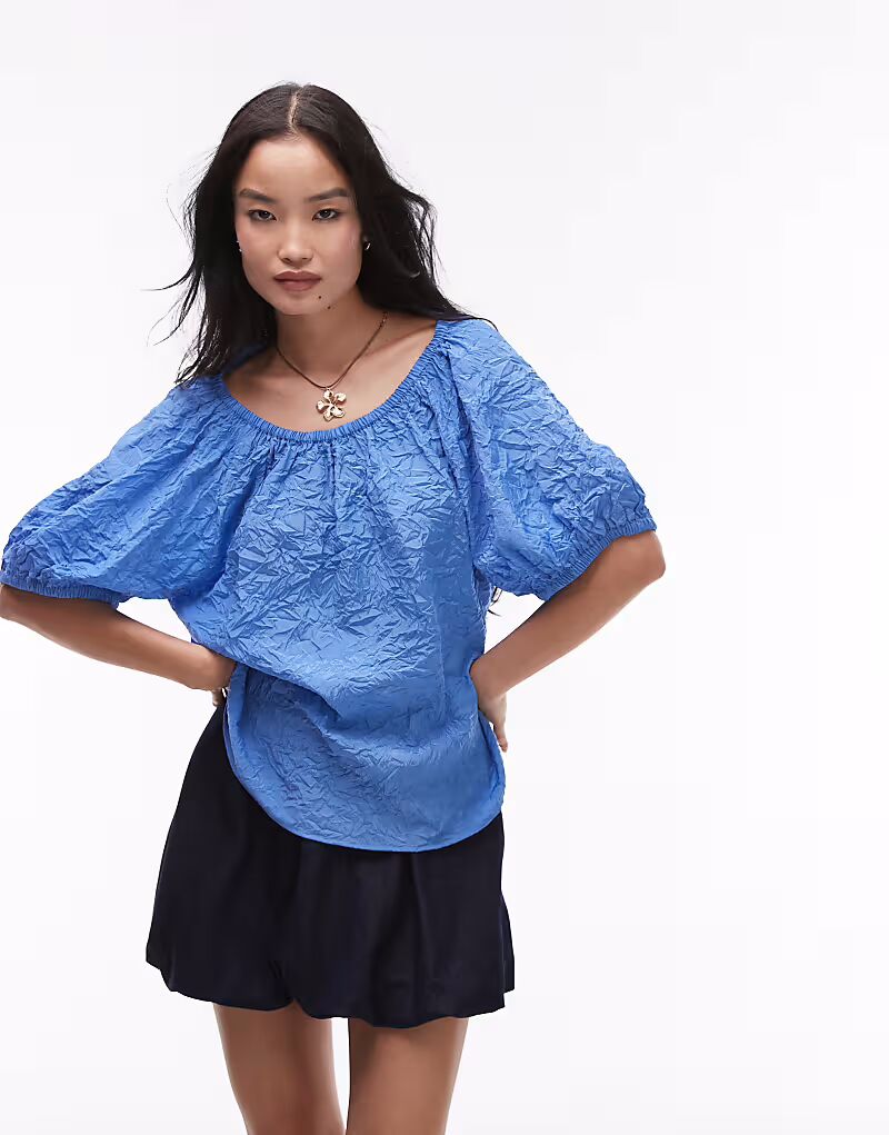 & Other Stories фактурная блузка с рукавами-фонариками и завязками на спине в форме замочной скважины синего цвета
& Other Stories фактурная блузка с рукавами-фонариками и завязками на спине в форме замочной скважины синего цвета