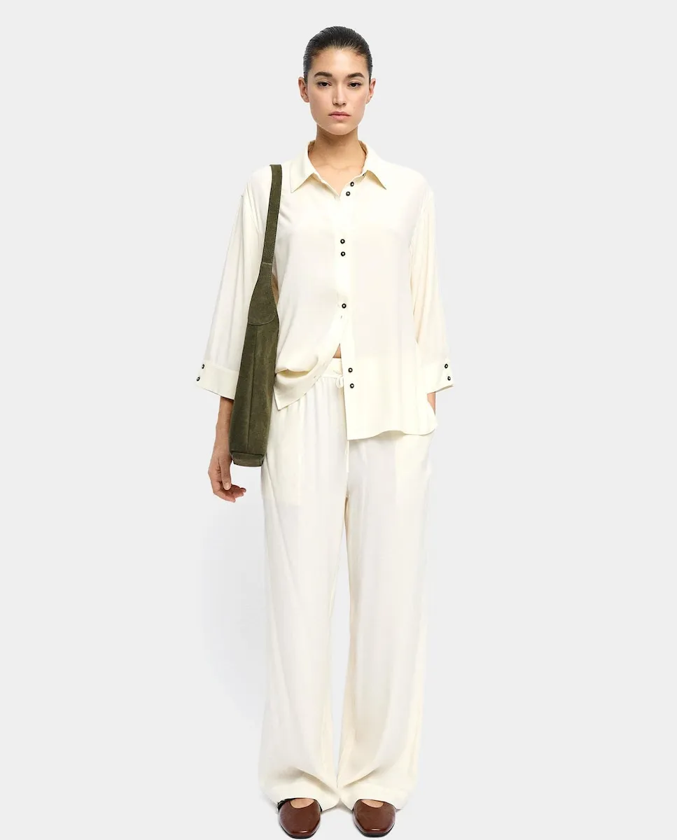 Женские свободные брюки с эластичным поясом однотонные Parfois, светло-бежевый
Женские свободные брюки с эластичным поясом однотонные Parfois, светло-бежевый