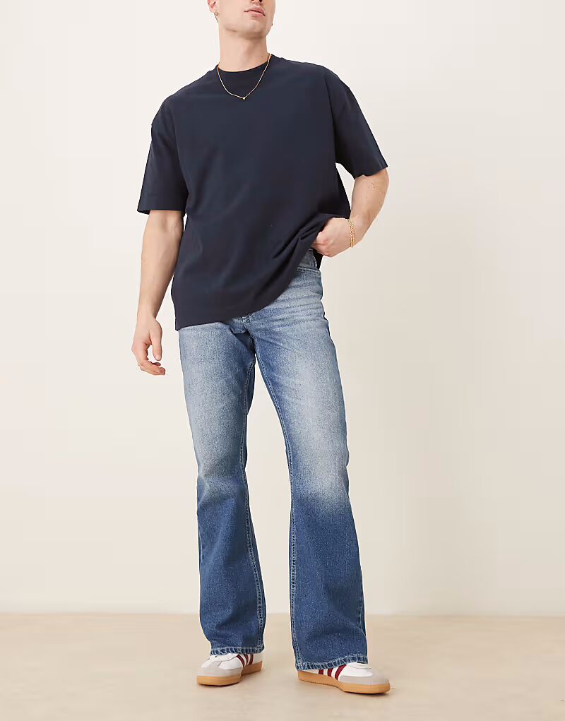 Джинсы расклешенные в винтажном стиле ASOS DESIGN темно-синего цвета
Джинсы расклешенные в винтажном стиле ASOS DESIGN темно-синего цвета