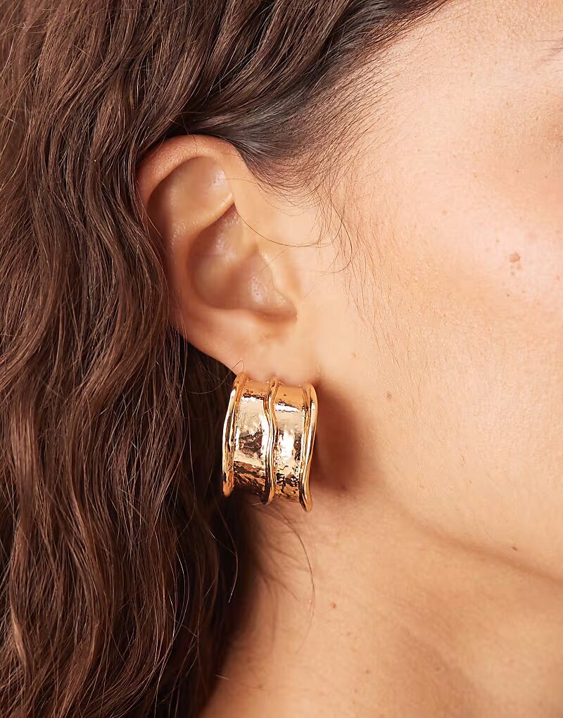 Широкие серьги-кольца в виде океанских волн из золота Accessorize
Широкие серьги-кольца в виде океанских волн из золота Accessorize