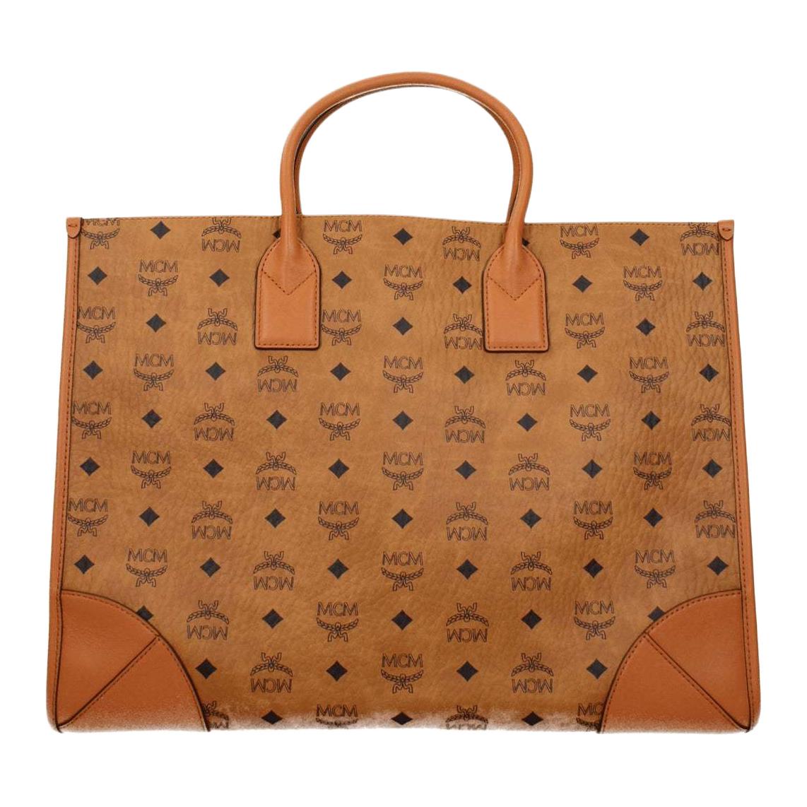 MCM Мюнхен искусственная кожа сумка комбинированная женская большая коричневая и коньячная
MCM Мюнхен искусственная кожа сумка комбинированная женская большая коричневая и коньячная