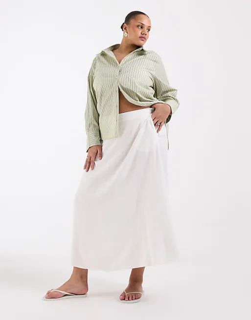 Белая льняная юбка миди Vero Moda Curve
Белая льняная юбка миди Vero Moda Curve