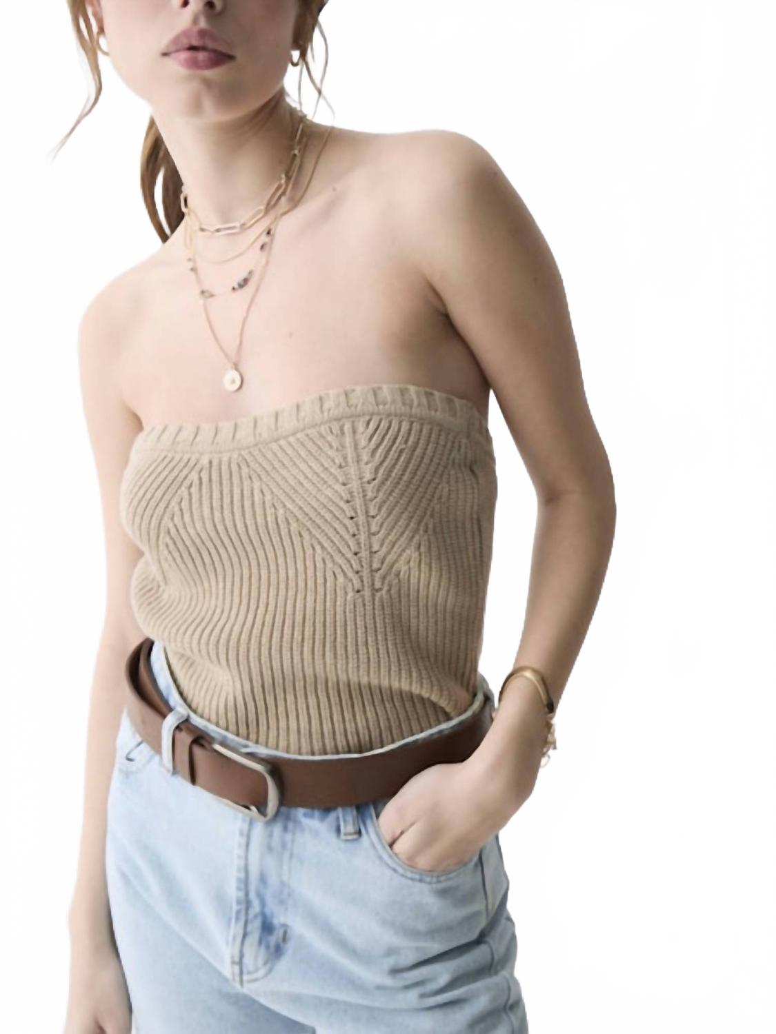 Бежевый трикотажный топ-труба Shea Dèluc
Бежевый трикотажный топ-труба Shea Dèluc