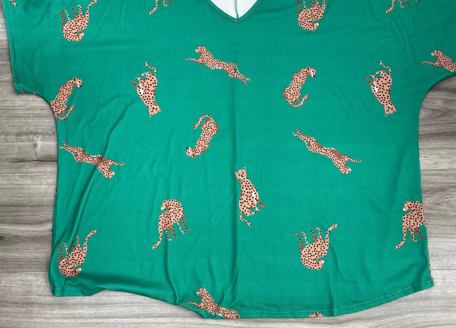 Женский топ Cheetah в зеленом цвете Entro
Женский топ Cheetah в зеленом цвете Entro