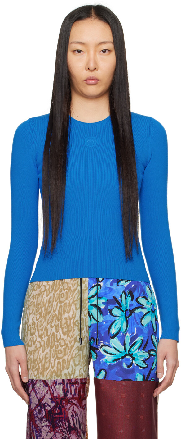 Синий свитер с сердечником Marine Serre
Синий свитер с сердечником Marine Serre